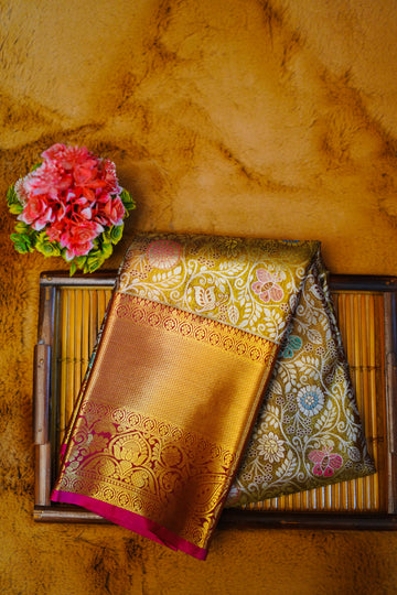 Golden meenakari kanjivaram zari woven silk saree